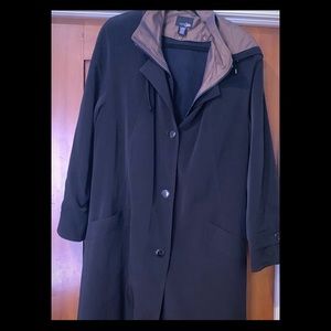 Coat for rain, snow and cold with detachable hood.